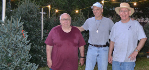 Ronnie Naiser with his two friends selling Christmas trees