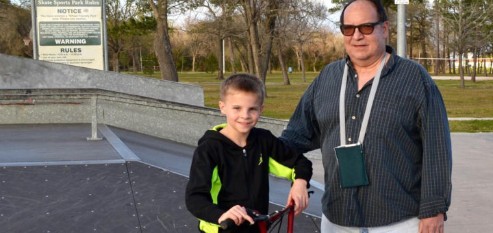 Sam Springer with grandson at skate park