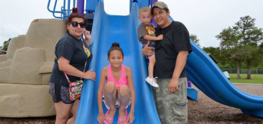 Family at playground slide