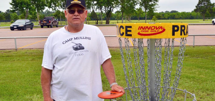 Retired state trooper playing disc golf