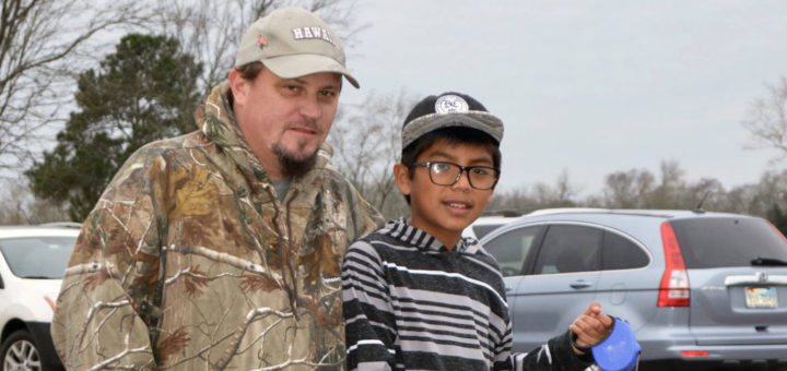 Trey Sanders with his son at the park