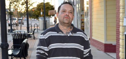 Vann holds a bag of food