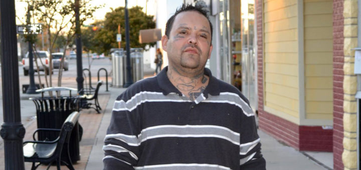 Vann holds a bag of food