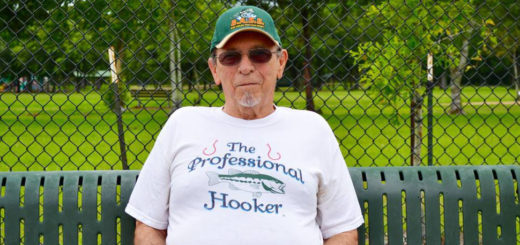 Man sits on park bench