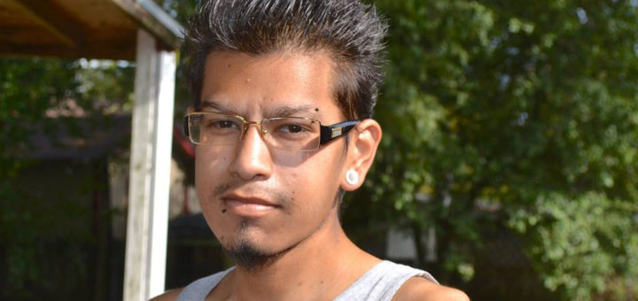 Rene Garcia in his yard