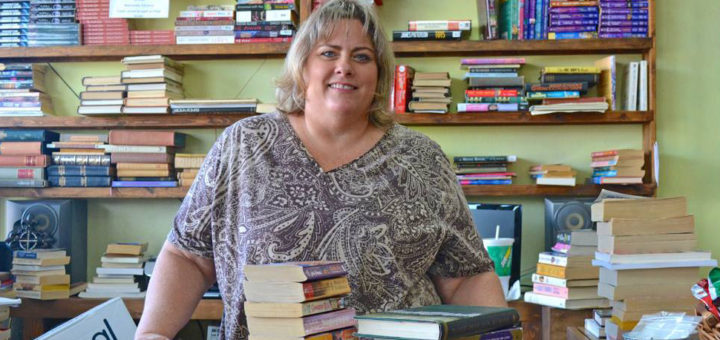 Woman in her book store