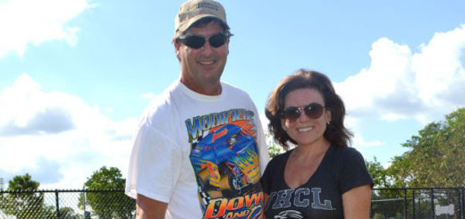 Husband and wife with their two dogs