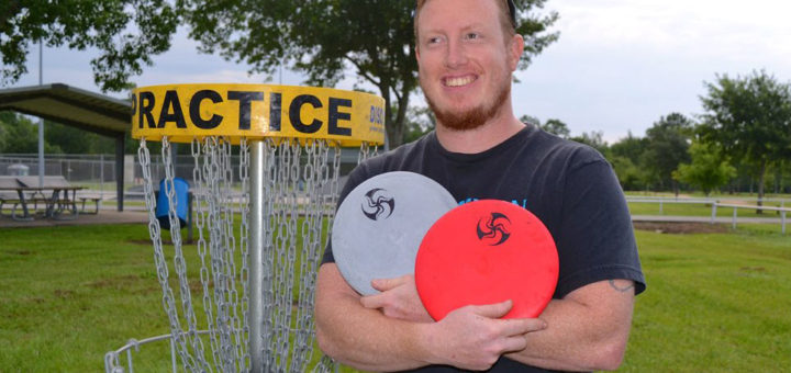Disc golfer at course