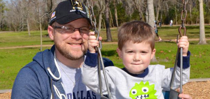 Father and son on a swing
