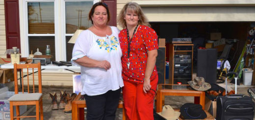 Sisters running a garage sale