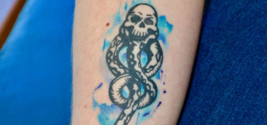 Arm with Harry Potter tattoo