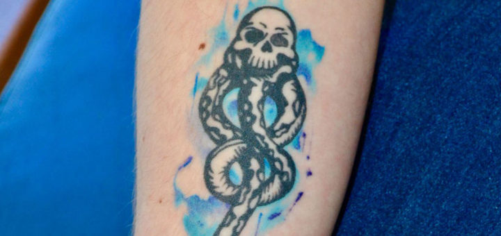 Arm with Harry Potter tattoo
