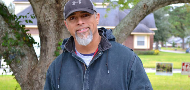 Man stands near tree