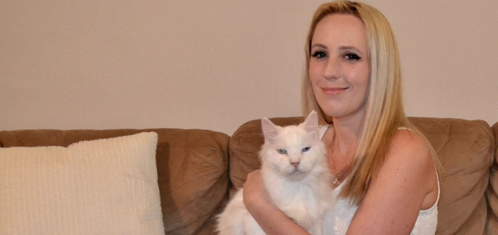 Samantha Rodriguez holds her cat