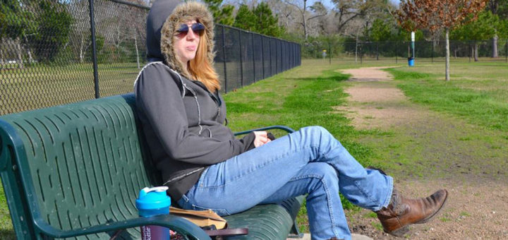 Young woman at dog park
