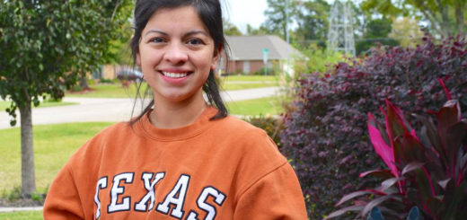 Woman wears University of Texas sweatshirt