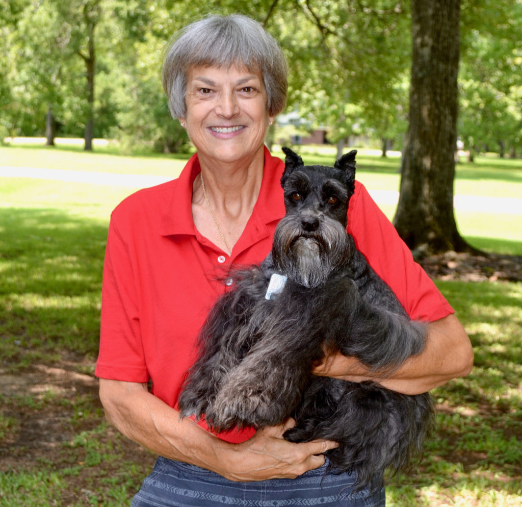 Robyne Gold holds her dog, Tara