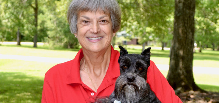 Robyne Gold holds her dog, Tara