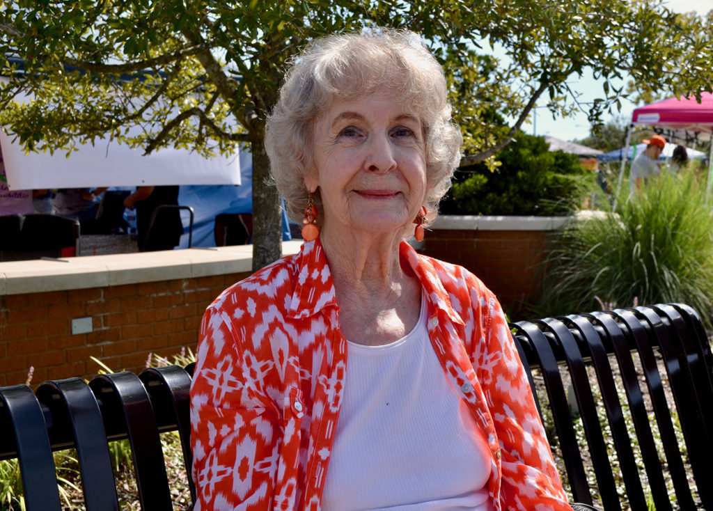 Joanne Webb sits on a park bench