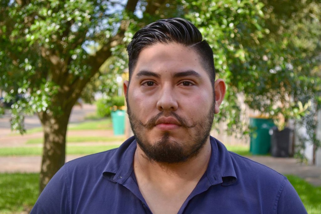 Joshua Villegas in his yard