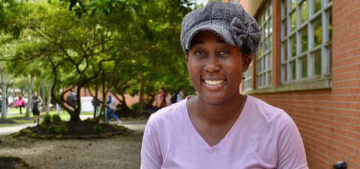 Nadege St. Marie sits outside at Lee College