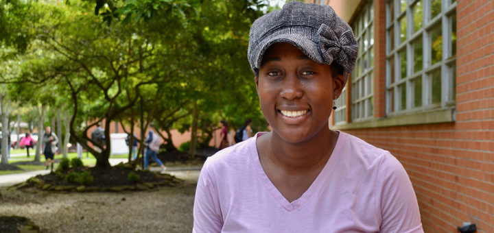 Nadege St. Marie sits outside at Lee College