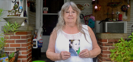 Marian Mims holds photo of her daughter