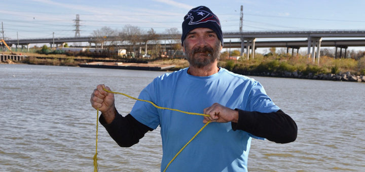 Pete Horbovetz holds a fish he caught