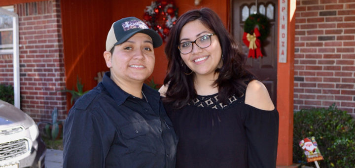 Samantha and Eufemia Espinoza stand outside their home