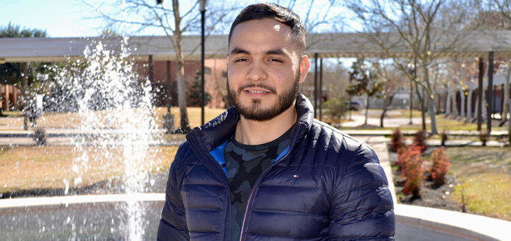 Francisco Acuna stands on Lee College campus