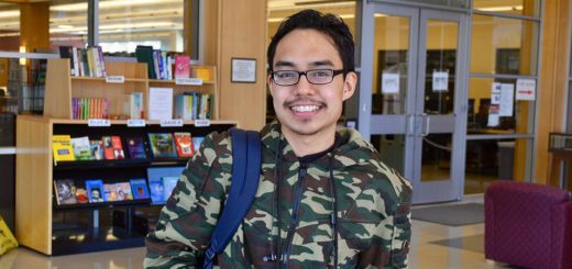 Xavier Tupag stands inside building at Lee College