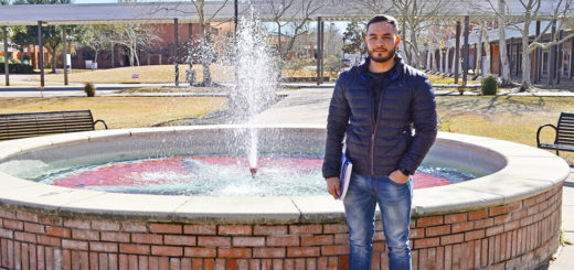 Francisco Acuna stands near a water fountain