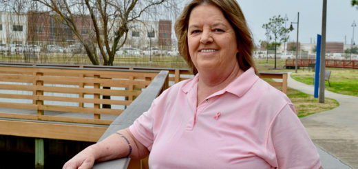Peggy Martin stands on a bridge