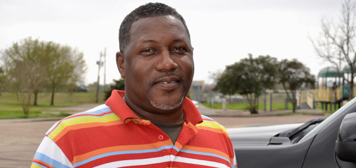 Cedric Pete stands near his truck
