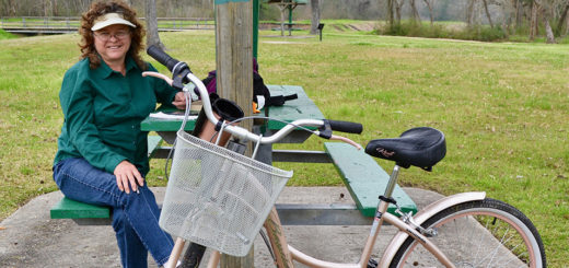 Elizabeth Rick sits near her bicycle