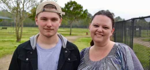 Leslie Hebert with her son, Luke, at the dog park