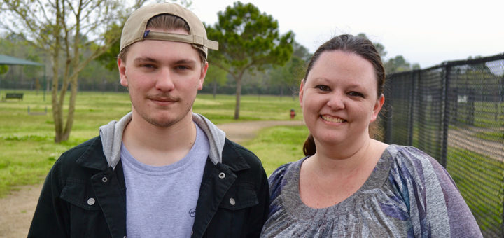 Leslie Hebert with her son, Luke, at the dog park
