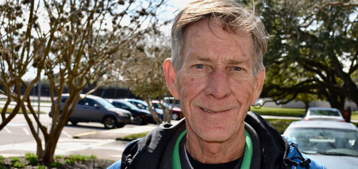 Michael Rodgers stands outside the library