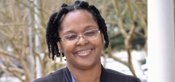 Tisha Manning stands outside library