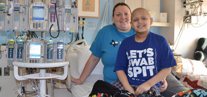 Jillian Presley and her son, Joey, in a hospital bed